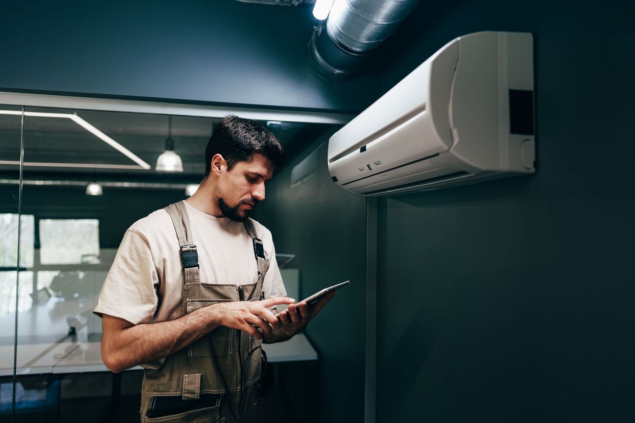 Tri-State technician completing a system inspection report